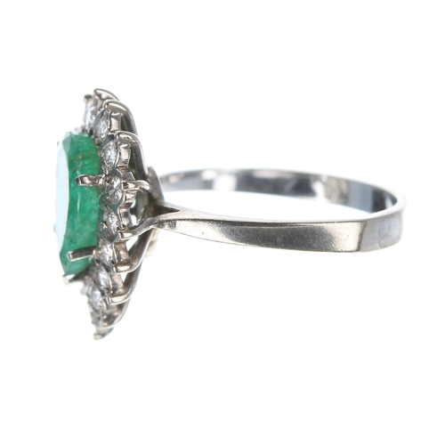 126 - Pear shaped emerald and diamond cluster white metal cluster ring, the emerald 1.40ct approx in a set... 