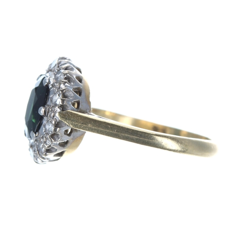 158 - 18ct and platinum sapphire and diamond oval cluster ring, the sapphire 1.30ct approx, width 13mm, 4.... 