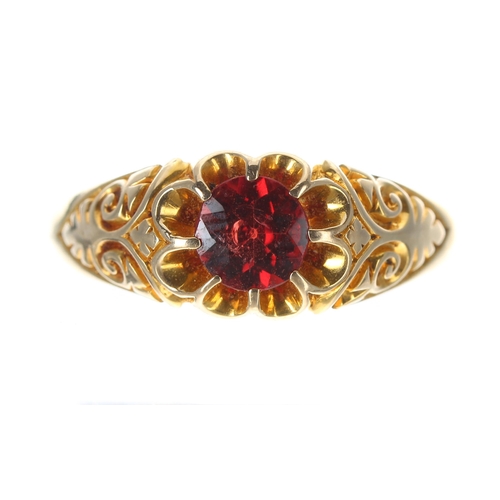 188 - Edwardian 18ct claw set garnet ring, Chester 1906, width 9mm, 6.8gm, ring size W (32)... 