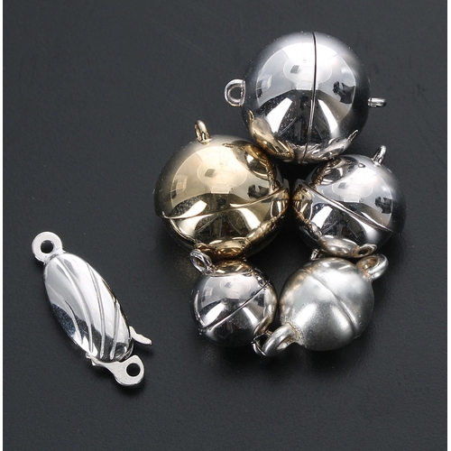 213 - Four 9ct gold cased magnetic ball clasps, 13.9gm; also two silver clasps (34)