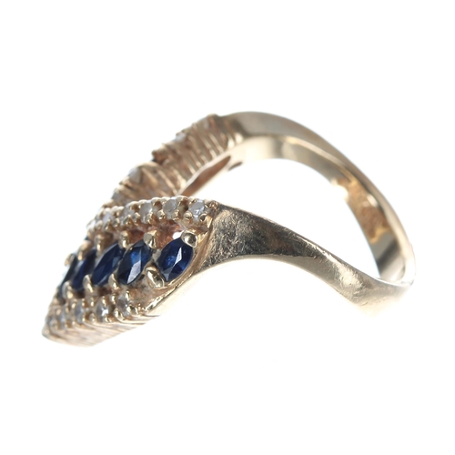 226 - 14ct wishbone design diamond and sapphire set ring, with a centre band of nine oval sapphires, 6.3gm... 