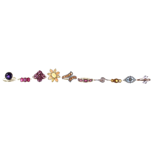 237 - Ten assorted silver gilt gem set rings, including three silver rose gilt rings (10)