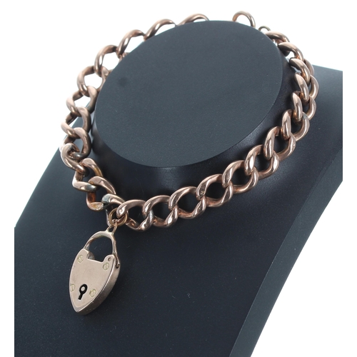 256 - 9ct rose gold curb link bracelet with a padlock clasp, with safety chain, 13.1gm