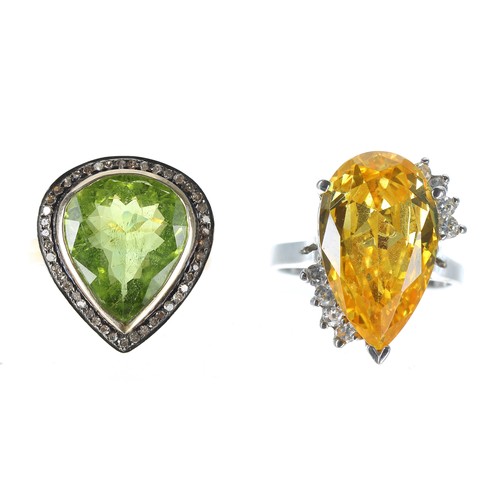 302 - Silver-gilt peridot and diamond pear shaped cluster, width 20mm, 5.9gm; with a silver yellow gem set... 