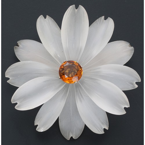 284 - Carved rock crystal flower brooch, set with a central round-cut citrine, 14.3gm, 43mm... 