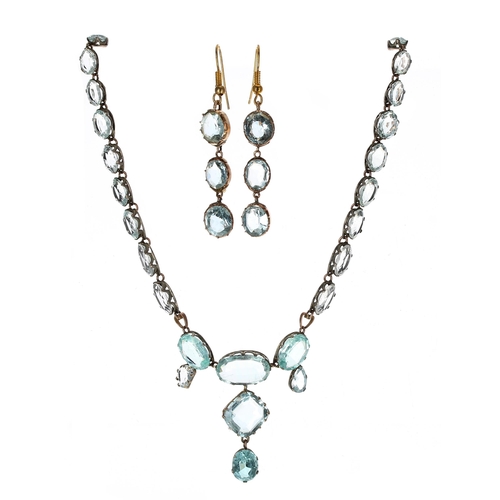 286 - Attractive silver-gilt aquamarine  necklace, set with twenty-six pale graduated oval stones to the i... 