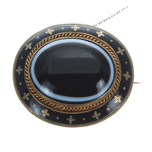 334 - Victorian gold, enamel and banded onyx oval mourning brooch, the cabouchon onyx in a black enamel an... 