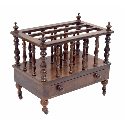 759 - Victorian rosewood Canterbury, with three divisions on turned spindle supports, over a single drawer... 