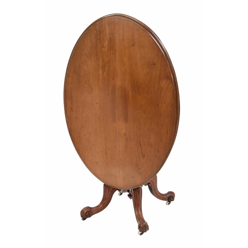 783 - Victorian oval mahogany tilt-top loo table, the moulded top over a central support raised on carved ... 