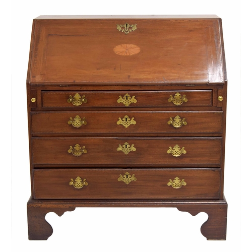 784 - George III mahogany bureau, the hinged fall front inlaid with an oval paterae enclosing a fitted div... 