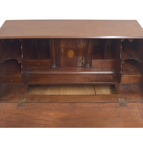 784 - George III mahogany bureau, the hinged fall front inlaid with an oval paterae enclosing a fitted div... 