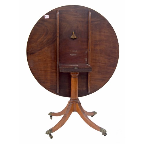 768 - Attractive Regency style rosewood circular tilt-top circular occasional table, crossbanded with a sa... 