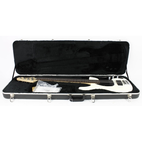 318 - Peavey Forum five string bass guitar, made in USA, ser. no. 08xxxxx6; Body: white finish; Neck: mapl... 