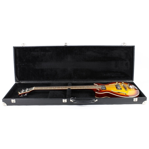 377 - Jay Turser semi-hollow body bass guitar; Finish: sunburst, a few minor scratches, vacant hole below ... 