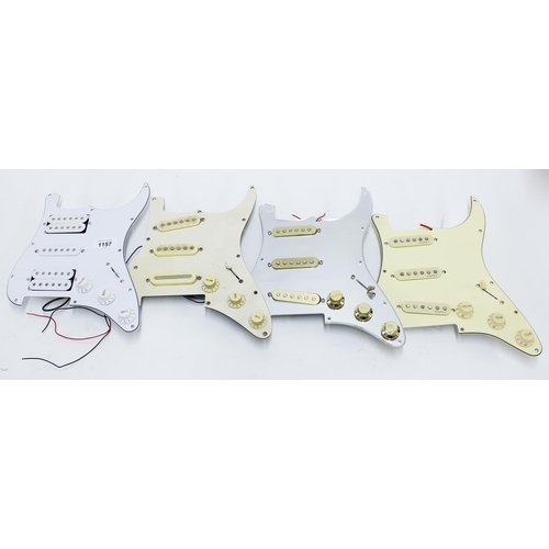 1157 - Four Strat style scratchplates, all fitted with Asian electrics (4)