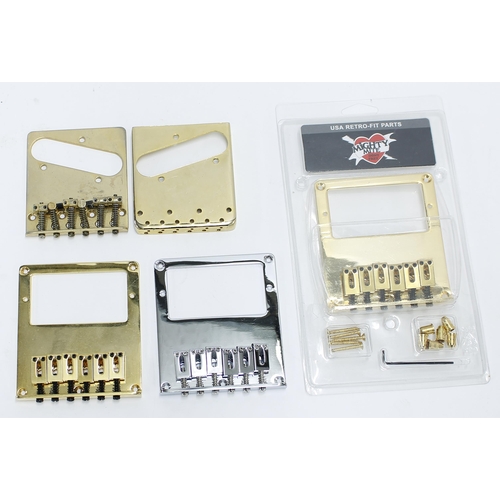 1169 - Three Mighty Mite humbucker Telecaster bridge plates; together with two other Telecaster bridge plat... 