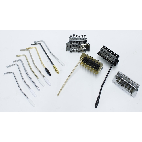 1171 - Six various tremolo guitar bridge blocks to include a Floyd Rose licensed bridge, a Babicz Strat typ... 