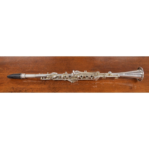 1844 - Metal clarinet inscribed Grand Rapids, made in U.S.A., ser. no. 91454A, two mouthpieces, case... 