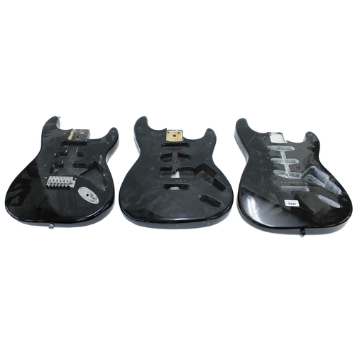 1141 - Three Strat type guitar bodies for projects, all with distressed black finish (3)