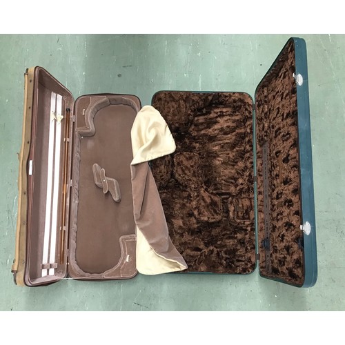 2075 - J. Winter oblong double violin case with brown plush lined fitted interior and outer zipper cover; a... 