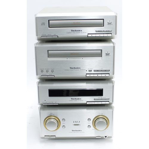 1245 - Four Technics hifi units to include an SE-HD350 stereo amplifier, an ST-HD350 stereo tuner, an RS-HD... 