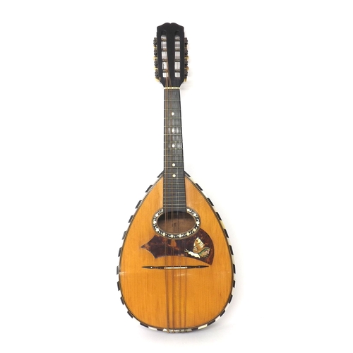 1577 - Old pear shaped mandolin with ebony and mother of pearl chevron banded spruce table, inlaid faux tor... 