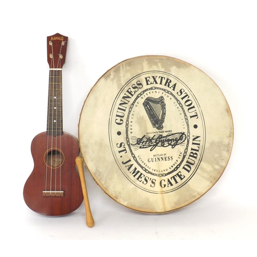 1579 - Mahalo ukulele, no. UK-220; also a Guinness advertising Bodrum with 17 1/2