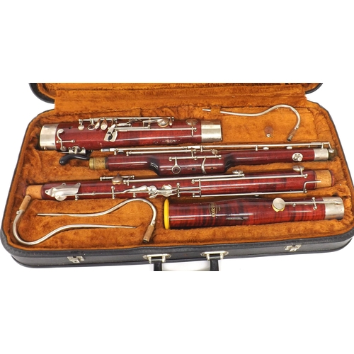 1850 - Corton bassoon with three crooks, fitted case 