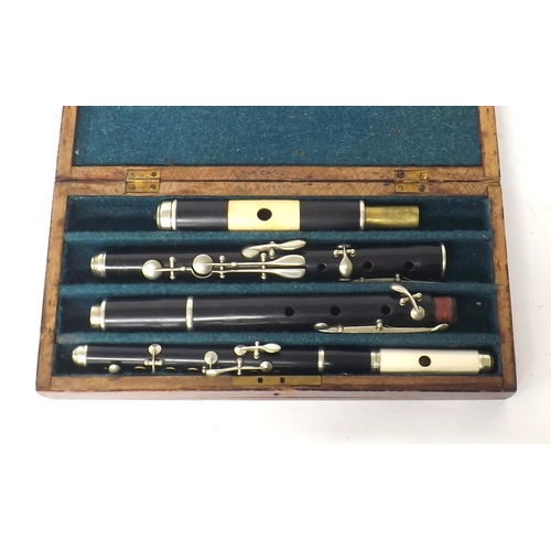 1853 - Eight key blackwood flute by and stamped Kay & Co Ltd, Worcester; also a blackwood and ivory six... 