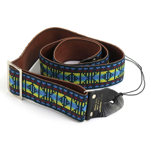 673 - Cat Stevens - a fabric guitar strap inscribed 'Rons will not put a message here' to the leather end,... 