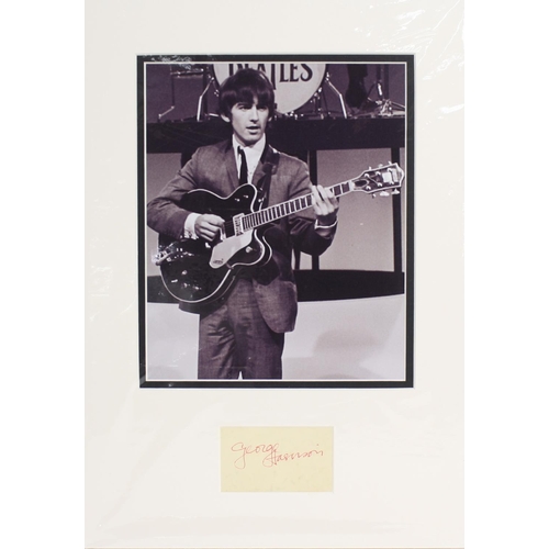 691 - George Harrison - autographed display, signed 'George Harrison' in red pen, mounted below a picture ... 