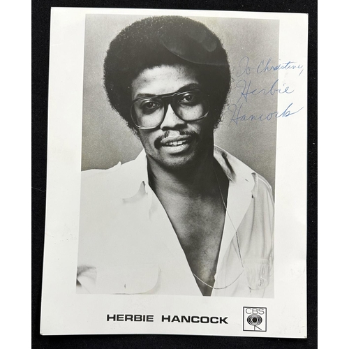 699 - Herbie Hancock - an autographed CBS promotional black and white photograph with tribute - 'To Christ... 