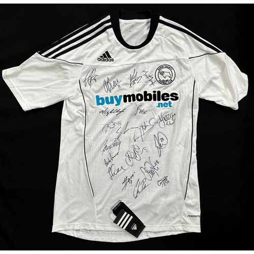 724 - Derby County FC - 2010/2011 Derby County football shirt, autographed by members of the first team... 