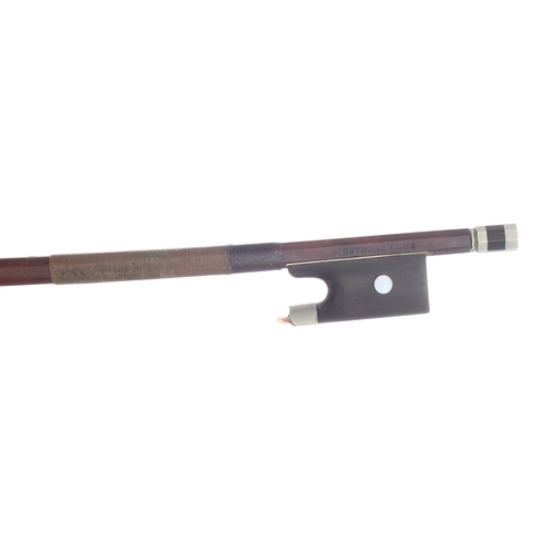 2250 - Nickel mounted violin bow stamped Emile Ouchard, the stick round, the ebony frog inlaid with pearl e... 