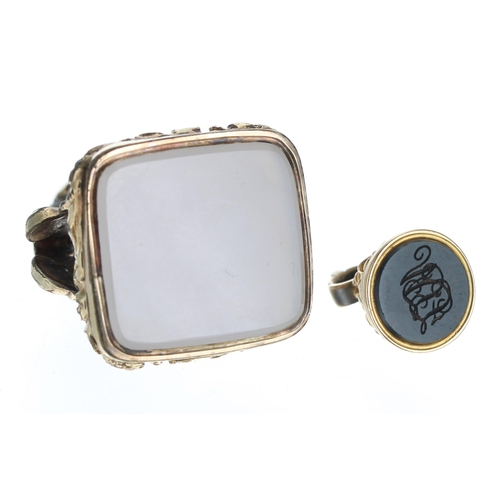 34 - Large 19th century gilt metal fob, 13.2gm, 38mm; with a smaller yellow metal fob with a bloodstone m... 