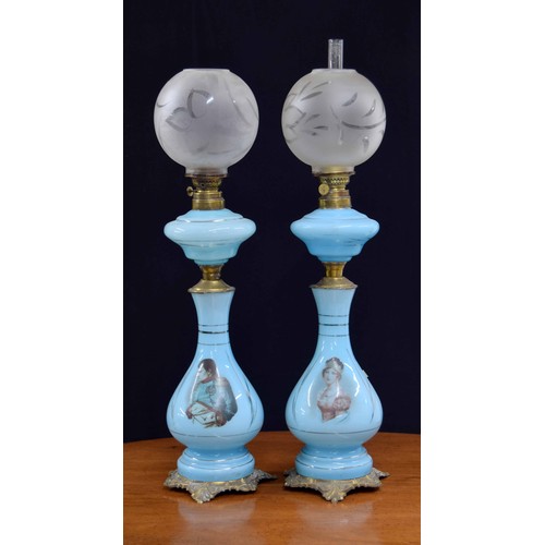 51 - Pair of 19th century opaline blue glass oil lamps, decorated with the portraits of Napoleon and Jose... 