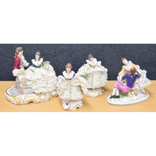 59 - Two Dresden lace porcelain figural groups of courting couples, largest 9