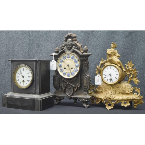 2308 - Interesting Continental cast iron two train mantel clock striking on a bell, 13.75