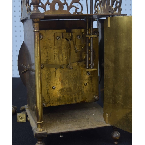 2118 - English brass two train spring driven brass lantern clock in need of restoration, the movement strik... 