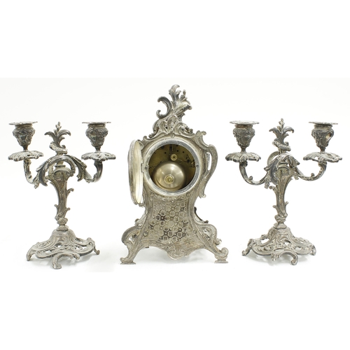 2319 - Decorative silvered two train mantel clock garniture, the Mougin movement striking on a bell, the 3.... 