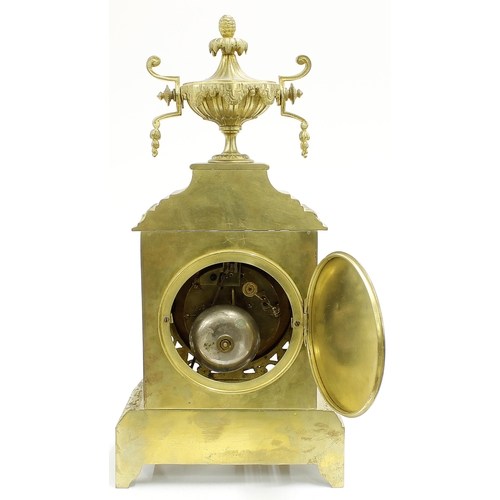 2327 - French brass two train ornate mantel clock striking on a bell, the 3.75