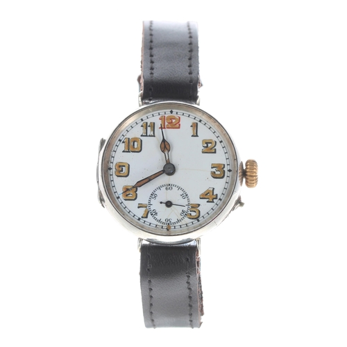 132 - Silver WWI period wire-lug trench wristwatch, import hallmarks London 1915, the enamel dial with Ara... 