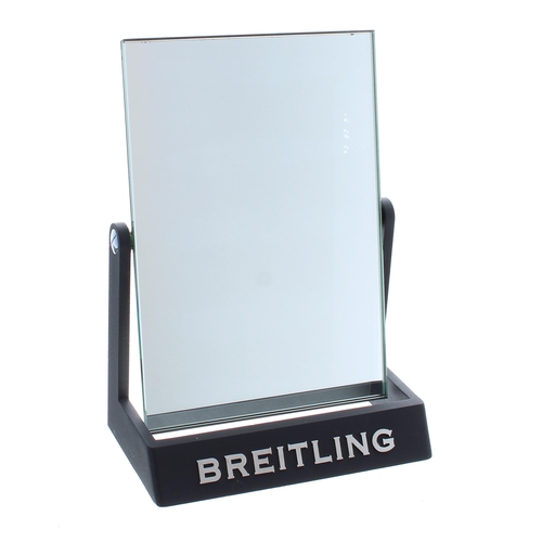 383 - Breitling counter display mirror, with signed grey base, 11.5'' high x 8.5'' wide