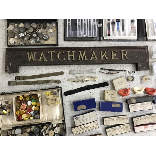 386 - Quantity of watch parts to include buttons, wheels, staffs, hairsprings, timing washers, balance whe... 