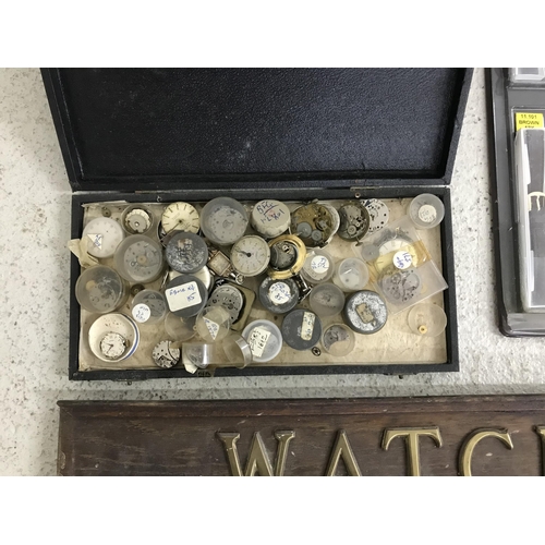 386 - Quantity of watch parts to include buttons, wheels, staffs, hairsprings, timing washers, balance whe... 