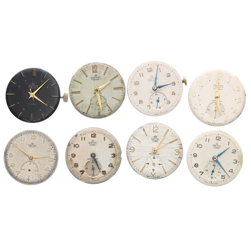 399 - Eight Smiths De Luxe wristwatch movements