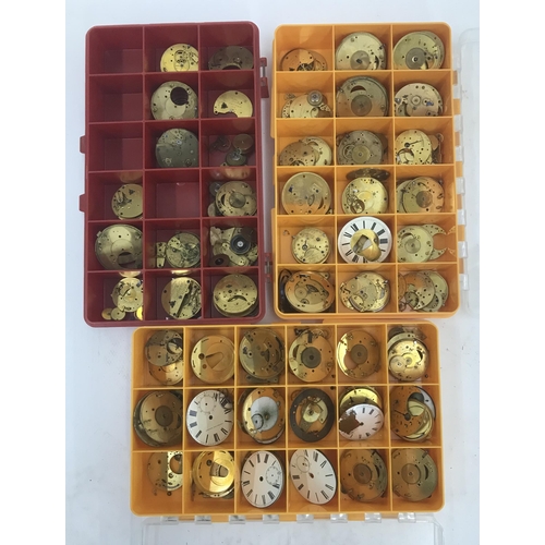 621 - Three trays containing a quantity of pocket watch movement parts; together with a twenty five drawer... 