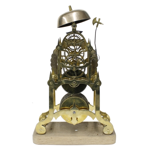 2521 - Brass single fusee skeleton clock with passing strike on a bell, the 4.5