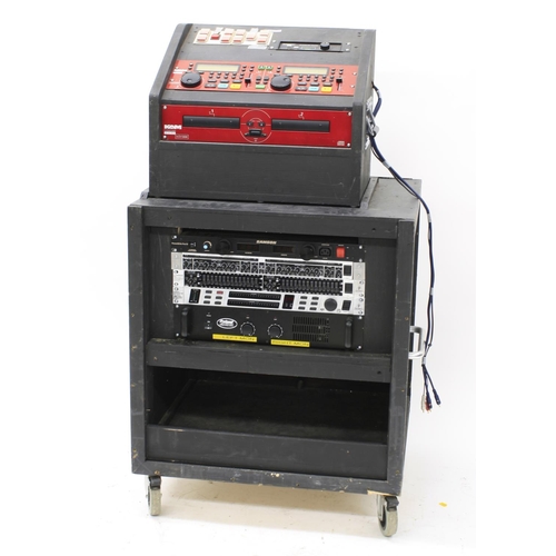 1306 - PA rack equipment, fitted into a bespoke wooden flight case on wheels, comprising a Kam Professional... 