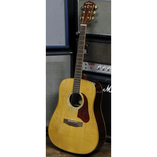 585 - Oakland 600 acoustic guitar, made in China; Back and sides: rosewood, surface scratches, minor split... 